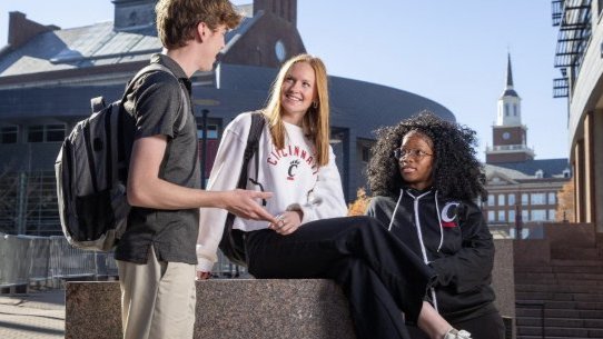 UC students talking on Mainstreet