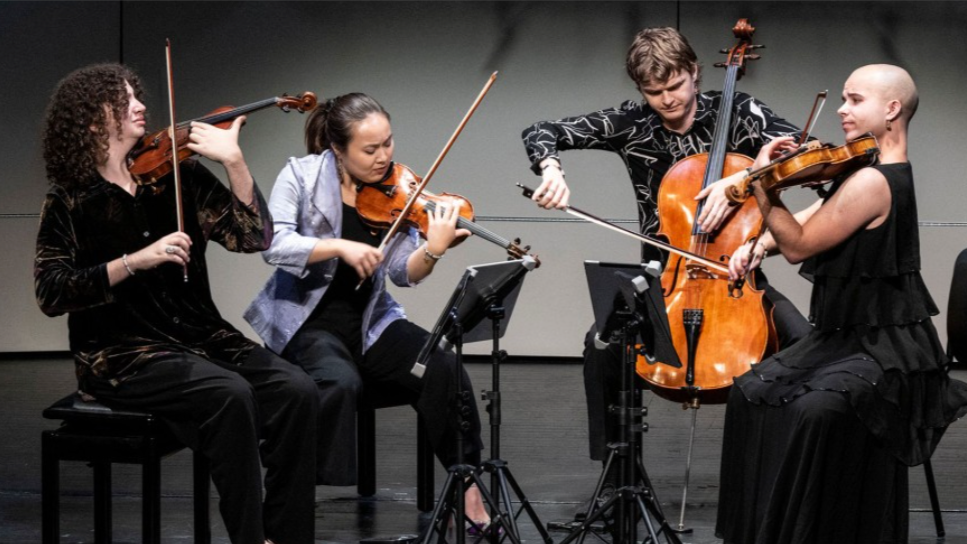 Poiesis Quartet performing on stage