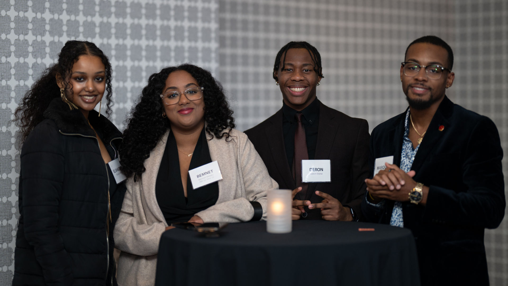 UC Alumni and students posing for a photo