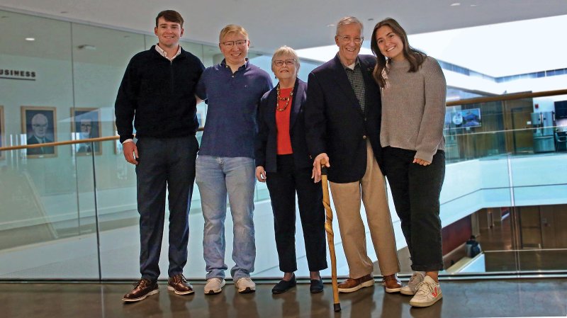 Pam and Tom Mischell posing with group
