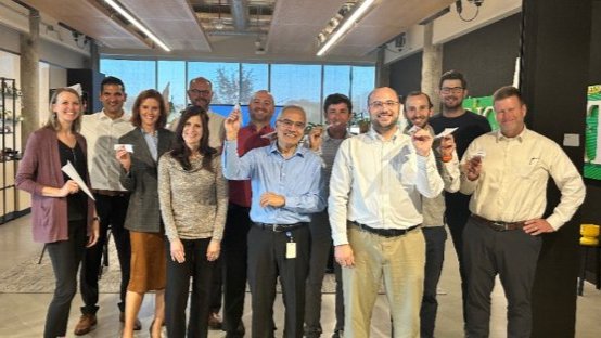 Learning Lab attendees posing outside the space