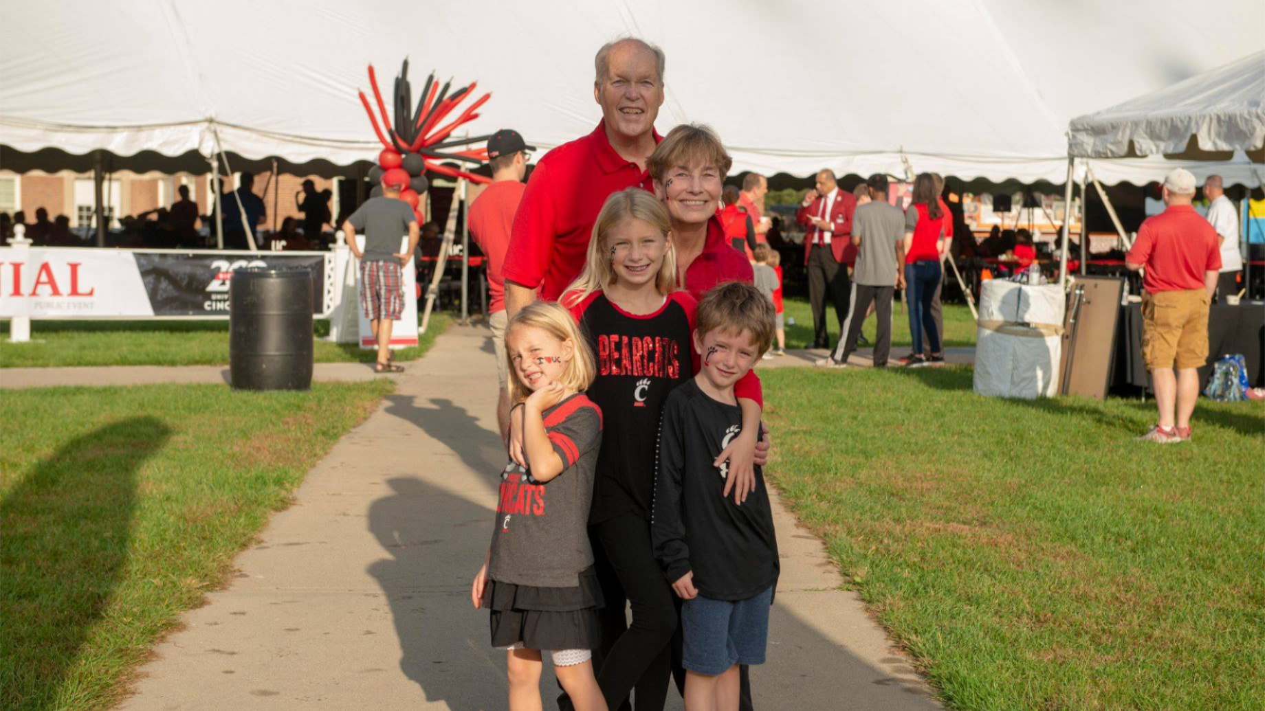 Bill Mulvihill smiling with his family
