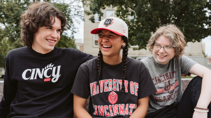 Three University of Cincinnati students laughing