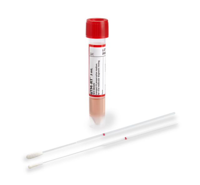 a person holding a tube with a yellow object in it