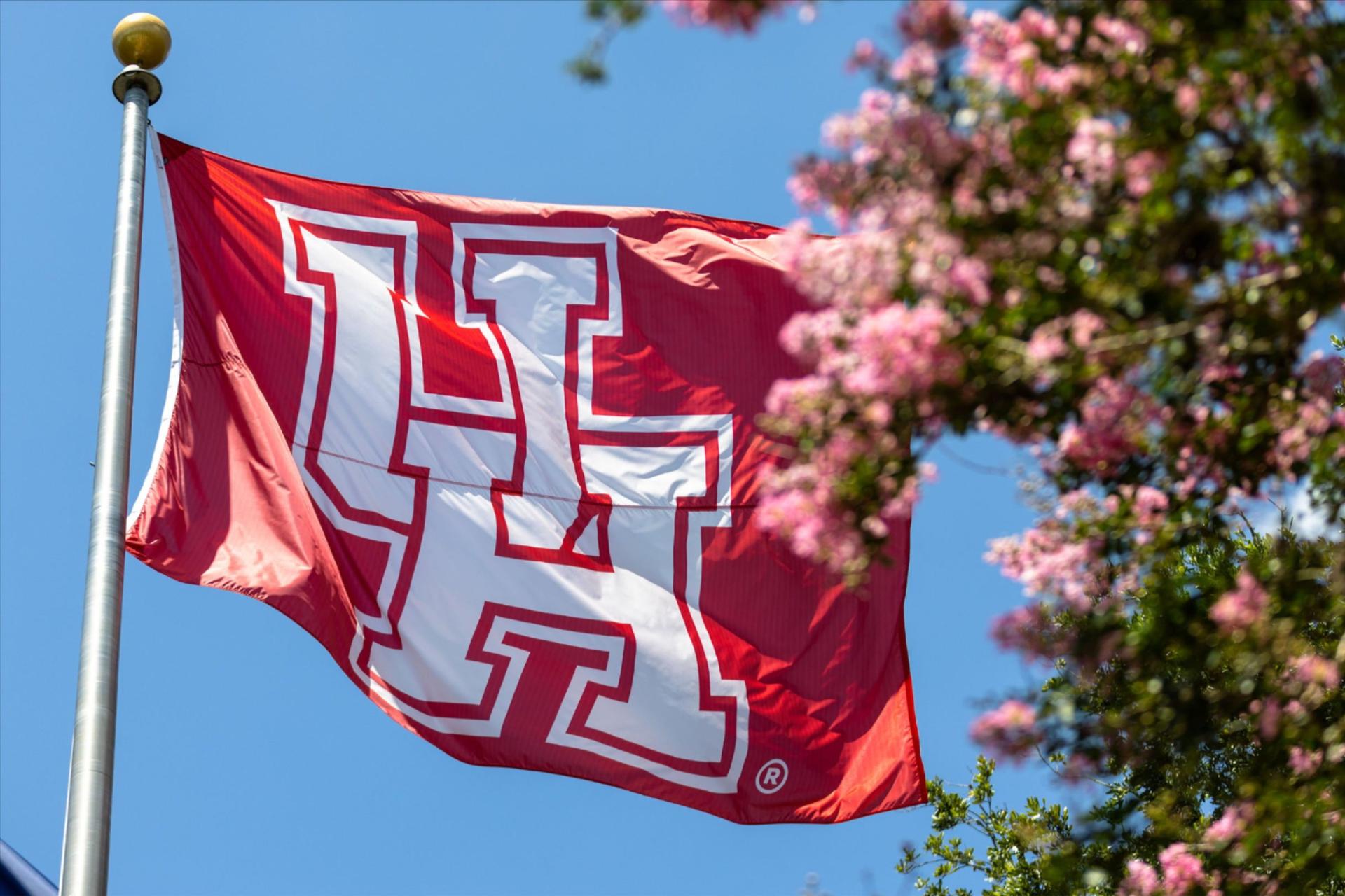 A UH flag blowing in the wind.