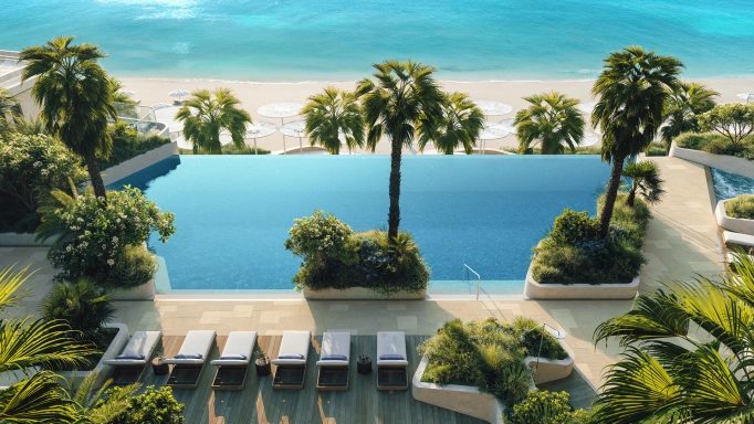 a woman wearing a pink coat and orange pants