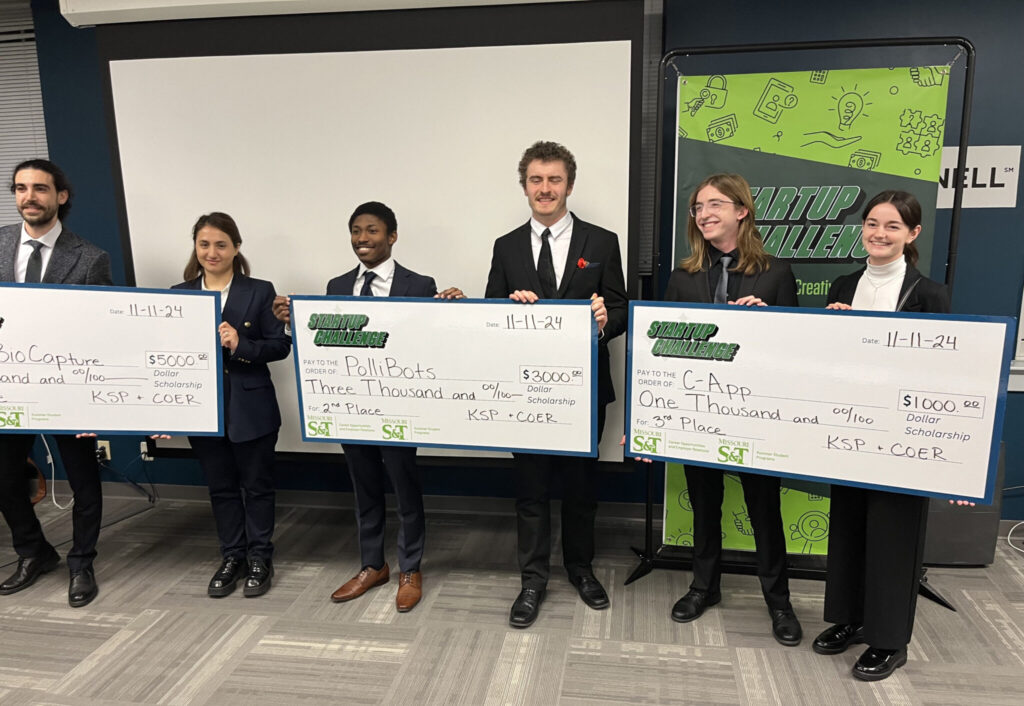 From left: Startup Challenge winners Alireza Fallahi and Niloofar Zendehdel with EcoBioCapture; Tohajie Raet and Adam Camerer with PolliBots; and Zachary Oakes and Mikayla Massie with C-App.