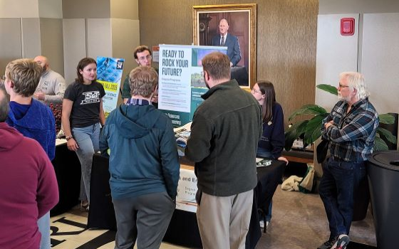 Student ambassadors meet prospective students and their families.