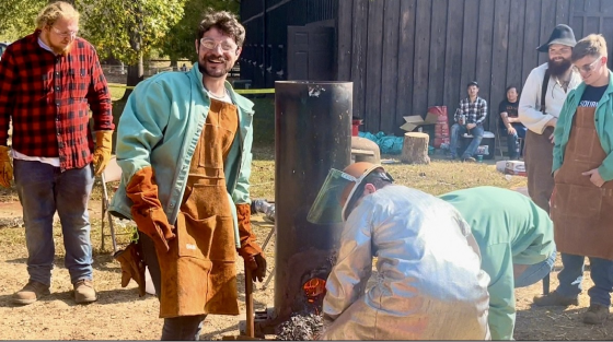 Students doing a iron-working demonstration at Maramec Spring Park.