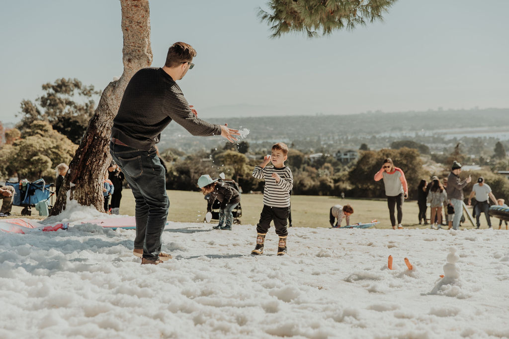 Neighbors and families gathered in the snow at Kate Sessions Park, Snow Day 2025