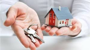 house keychain and key in door knob