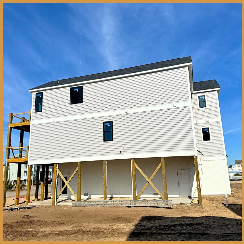 side view of Town homes in the final stages of being built side view of Town homes in the final stages of being built