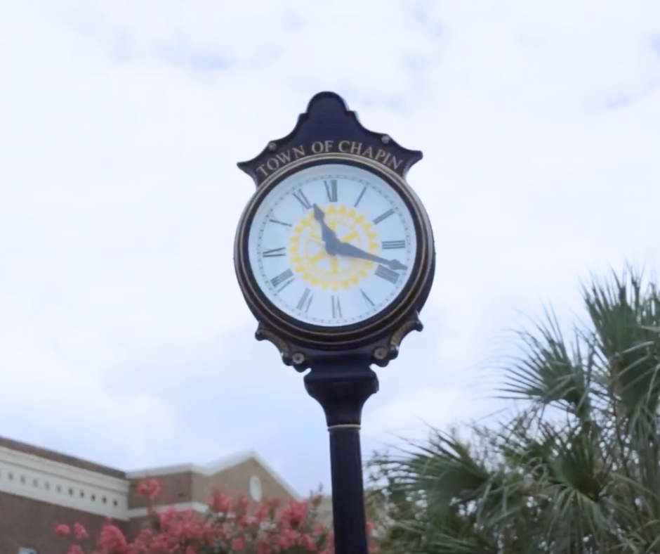 Historic town clock in downtown Chapin, SC, symbolizing the charming small-town atmosphere and community pride. -realtorlakemurraysc.com
