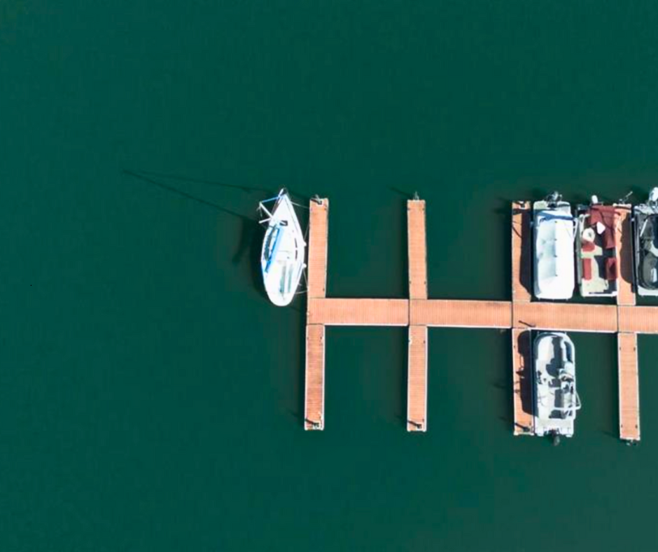 Private docks in a Lake Murray waterfront community with calm water, boat slips, and scenic shoreline—ideal for lake living in Chapin, SC. - realtorlakemurraysc.com