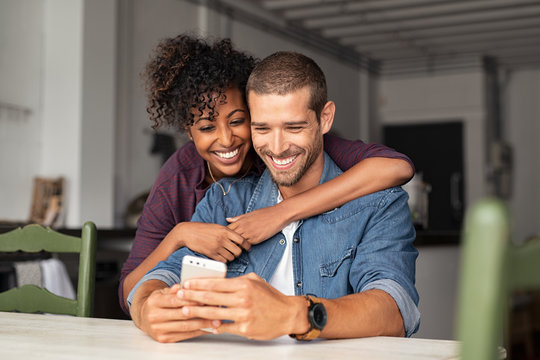 couple looking at phone