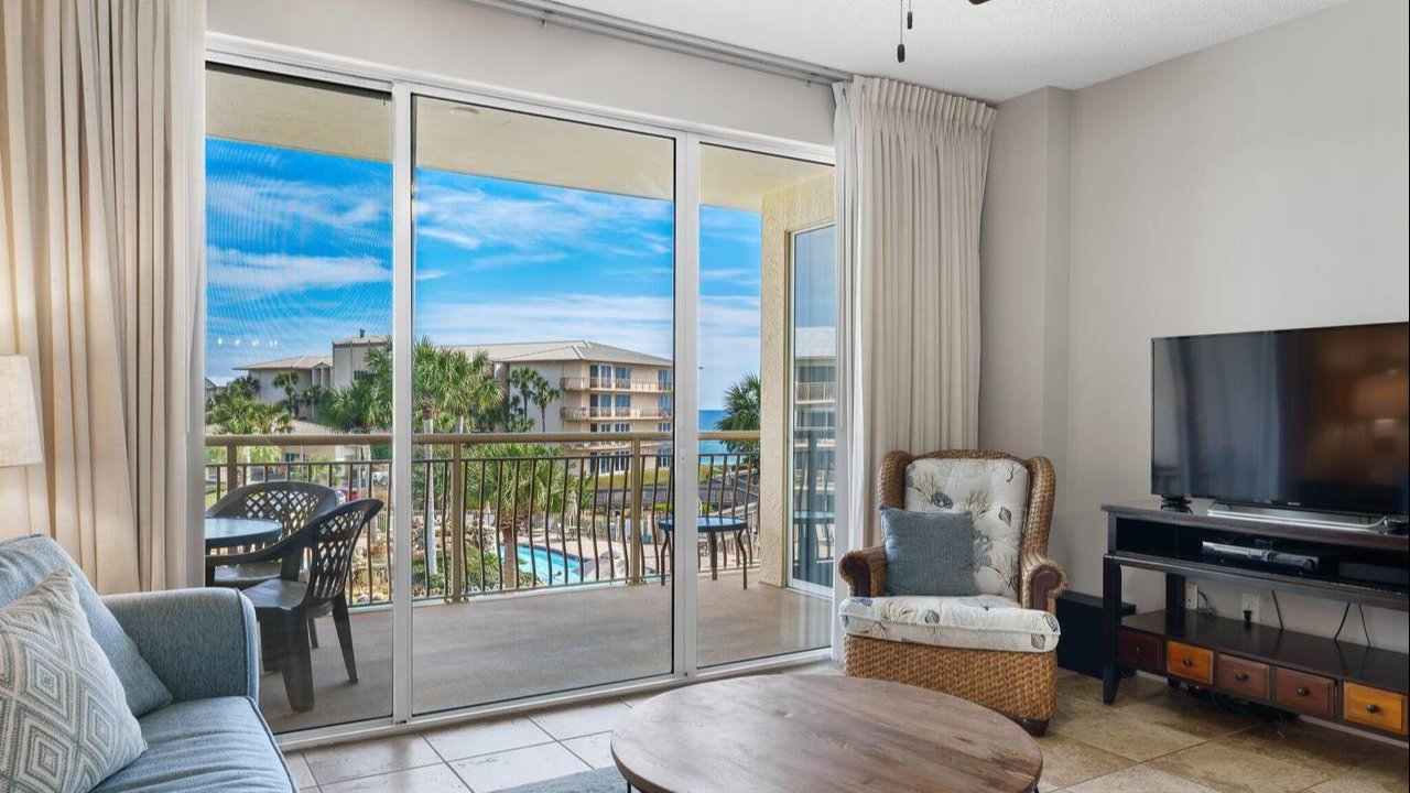 luxurious living room with a view of the high pointe resort condos pool luxurious living room with a view of the high pointe resort condos pool