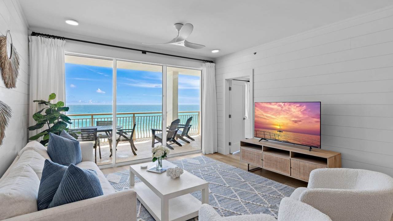 luxurious living room of a rosemary beach home with a view of the beach outside the window luxurious living room of a rosemary beach home with a view of the beach outside the window