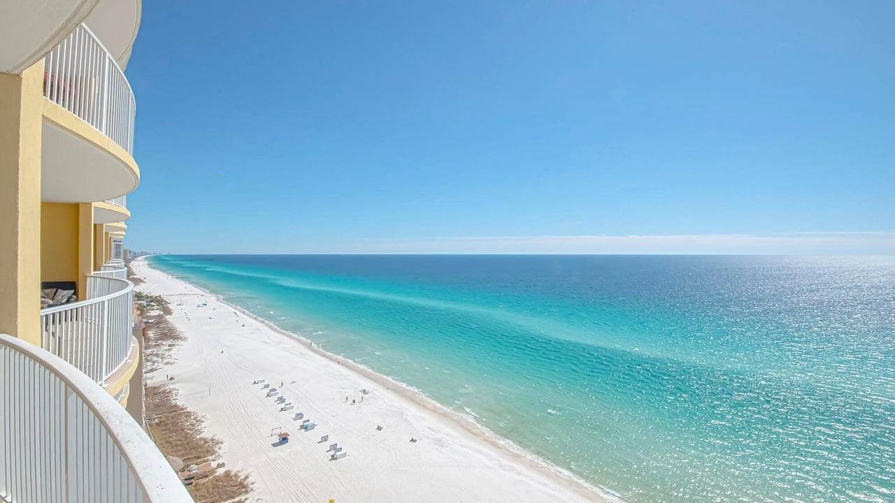 view of the vibrant greenish blue gulf from the balcony of an emerald isle condo view of the vibrant greenish blue gulf from the balcony of an emerald isle condo
