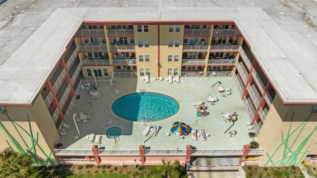 aerial view of the pool that occupies paradise shores condo