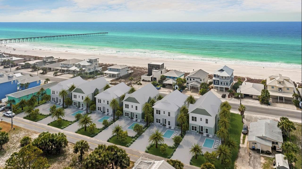aerial view of the pier park homes along the coastline aerial view of the pier park homes along the coastline