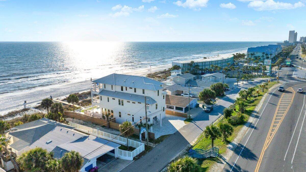 aerial view of multiple panama city beach homes on the coast