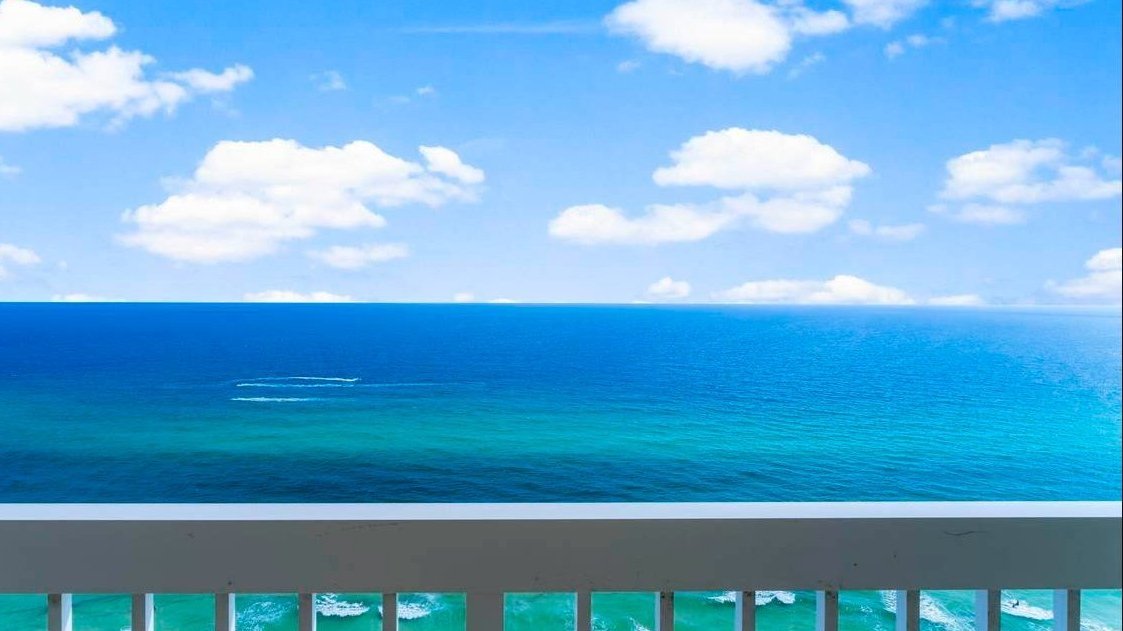 view of the gulf from a celadon beach resort condo balcony