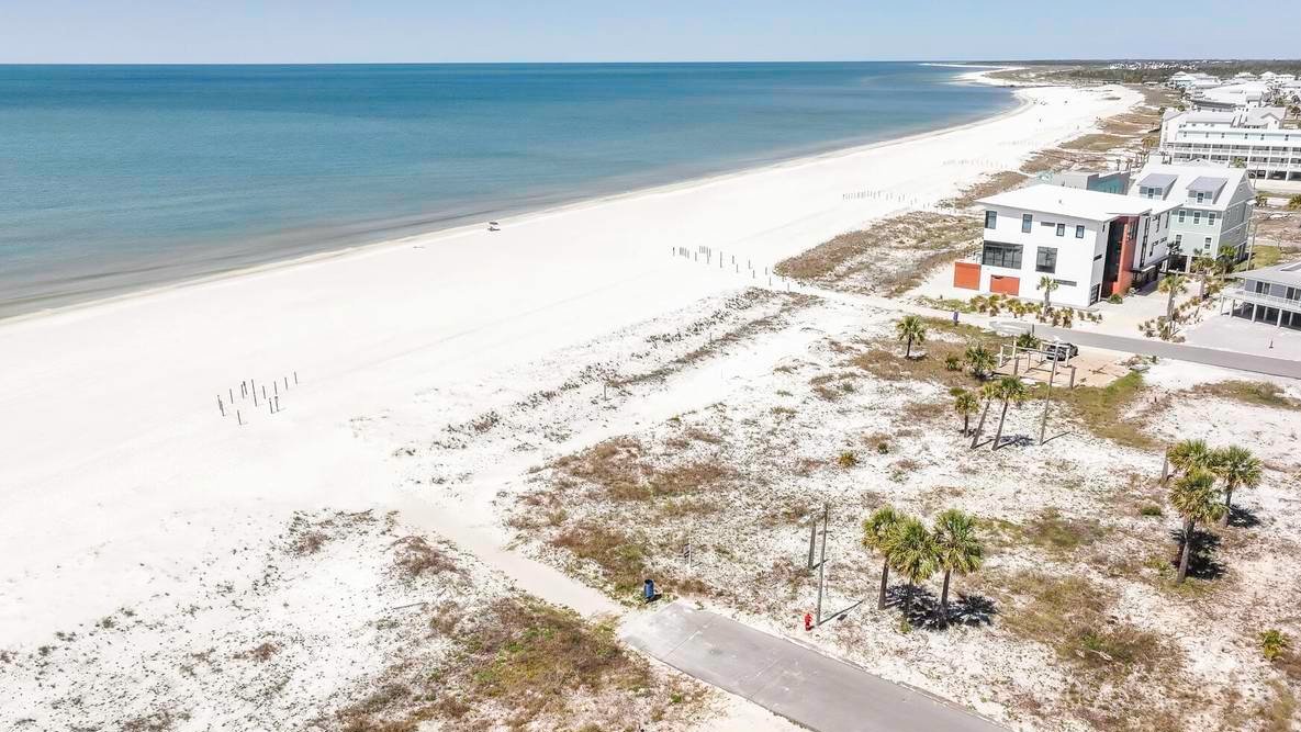 aerial view of a few mexico beach homes right on the beach