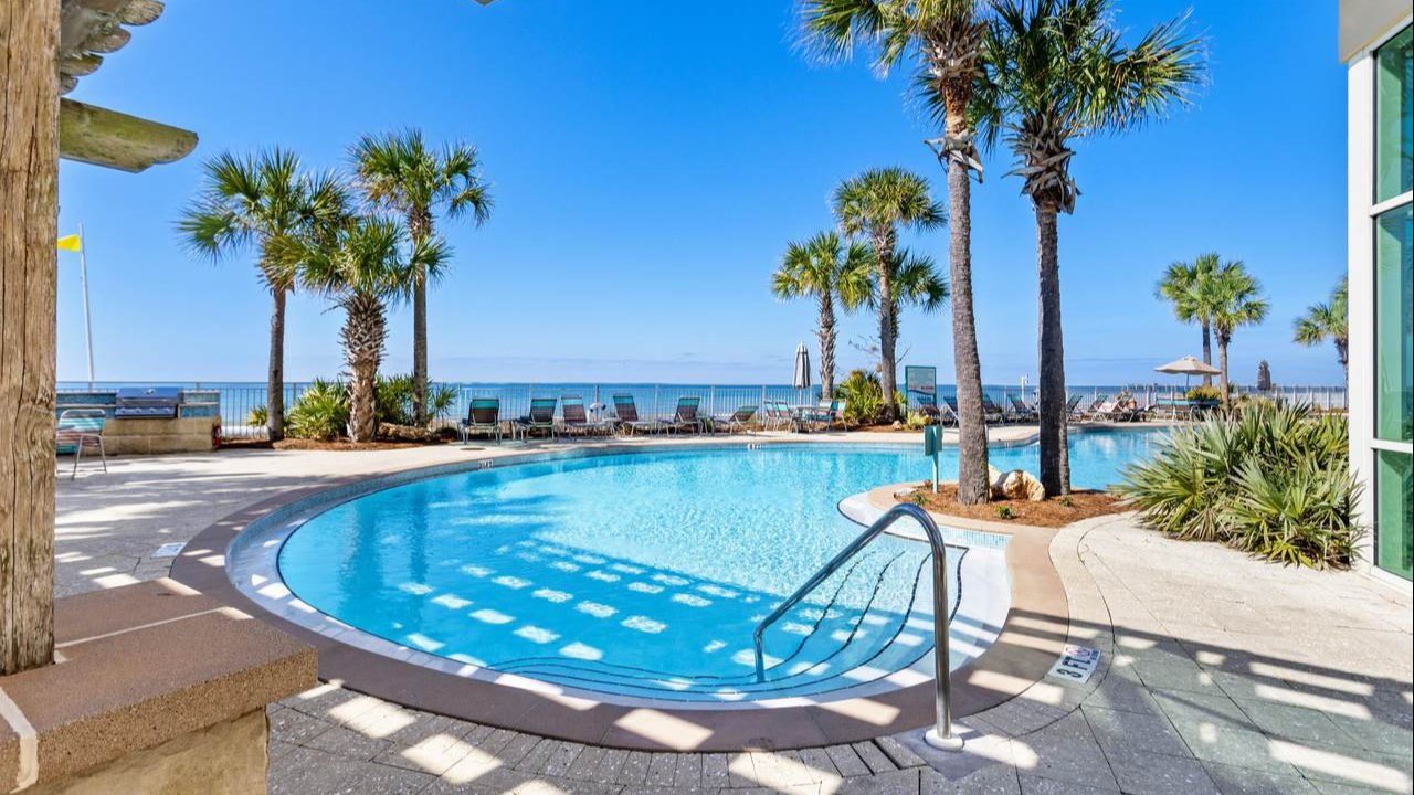aqua condos pool with a view of the beach in the back aqua condos pool with a view of the beach in the back