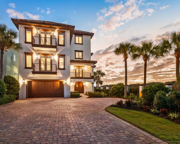 Stunning twighlight view of emerald coast home