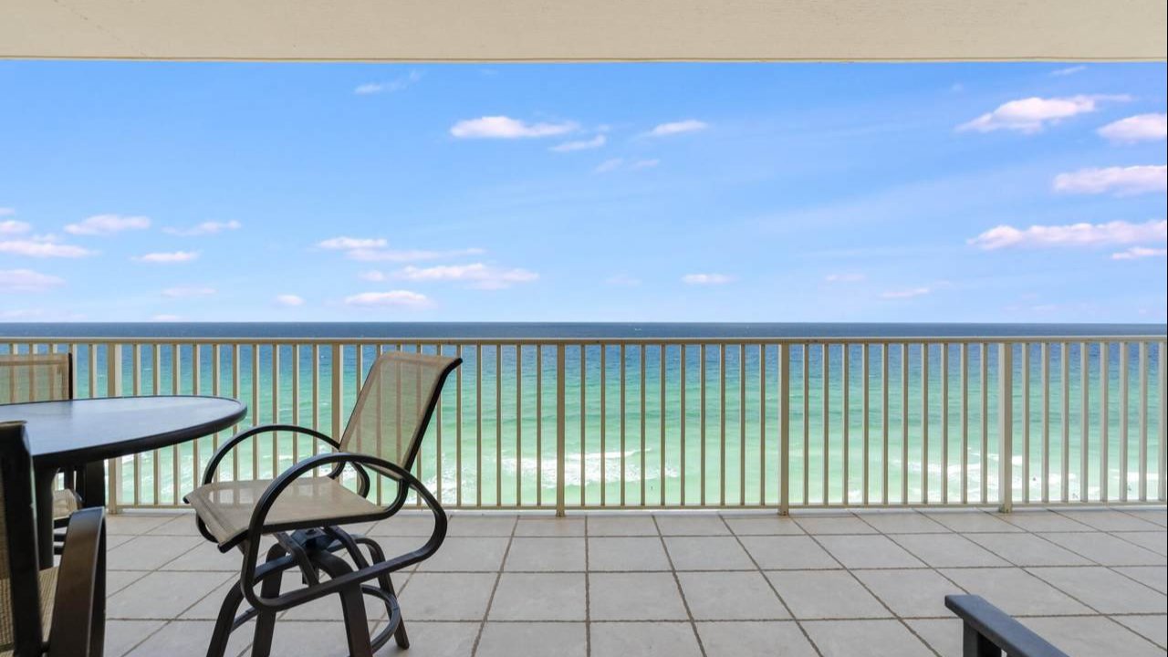 view of the beach from the balcony of a grande surf club condo