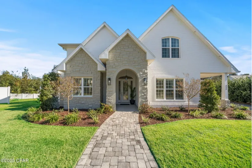 white bricked cove home with a beautiful front yard white bricked cove home with a beautiful front yard