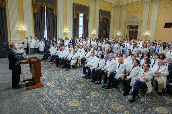 Photo of Rep. Greg Murphy, MD (R-N.C.), addressing a crowd of physicians at the AMA’s Fix Medicare Now briefing.