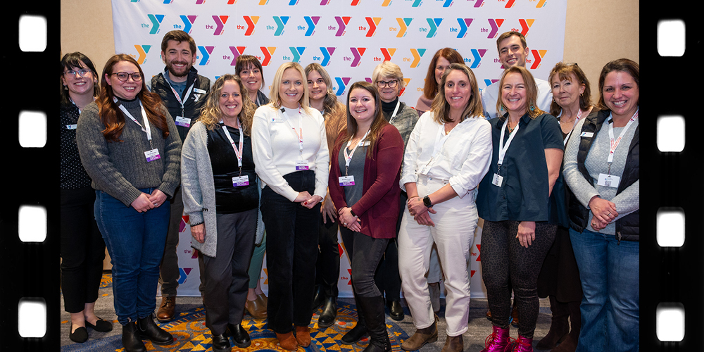 Abby Delena, CLC YMCA Community Navigator Manager, as she plays Red Ball and learns the fundamentals of tennis from John McFadden, CLC YMCA Tennis Pro and Lord of the Strings Coach