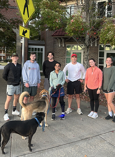 Dean Usha R. Rodrigues regularly runs with students (and four-legged companions), which provides a great mix of fresh air, exercise and meaningful connection