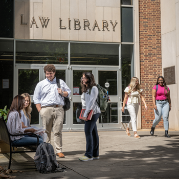 students in front  of the law library