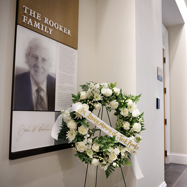 a funerary wreath  placed in front of John Rooker's portrait