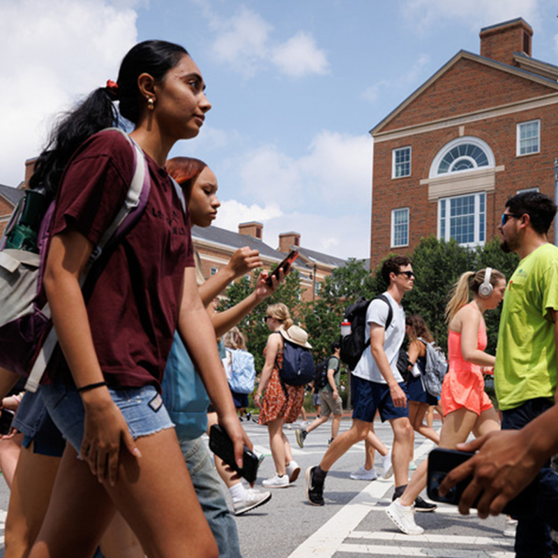 Students cross Lumpkin Street at class change en masse