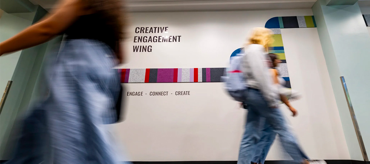 Students walking into the Creative Engagement Wing in the Miller Learning Center. (Dorothy Kozlowski/UGA)