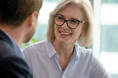 Smiling woman with glasses