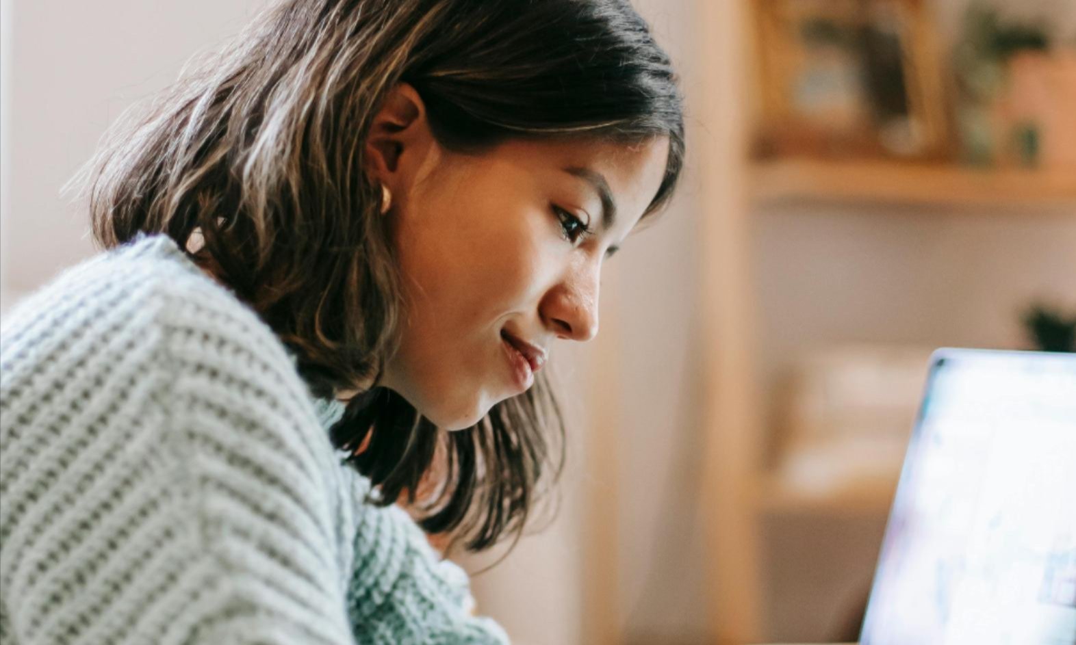 Homeowner reviewing flooring samples for an in-home estimate from Aspen Carpet & Floors, trusted flooring experts in Aspen, CO Homeowner reviewing flooring samples for an in-home estimate from Aspen Carpet & Floors, trusted flooring experts in Aspen, CO