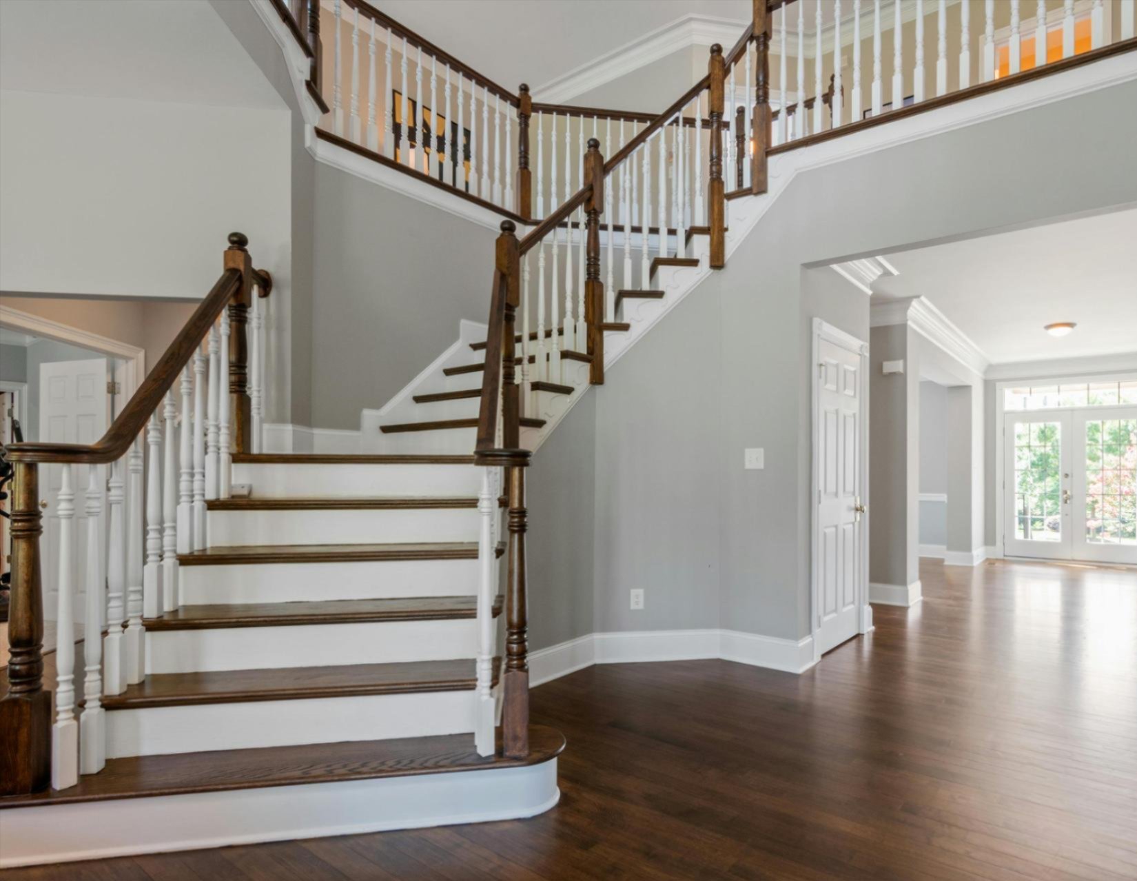 Elegant hardwood staircase and flooring installed by Aspen Carpet & Floors – premium hardwood, carpet, and tile in Aspen, CO. Elegant hardwood staircase and flooring installed by Aspen Carpet & Floors – premium hardwood, carpet, and tile in Aspen, CO.