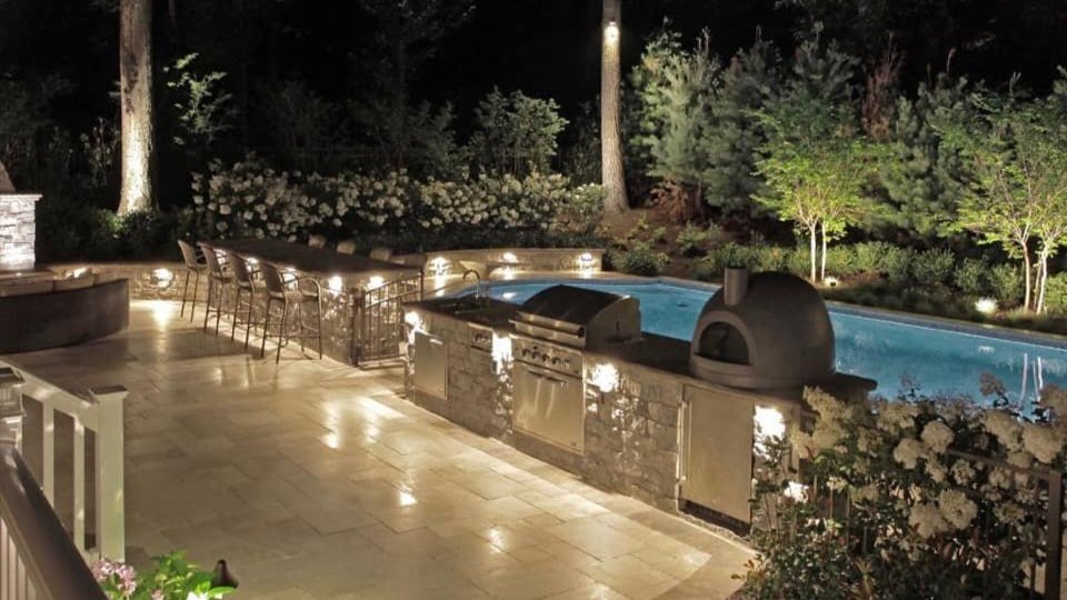 Luxury outdoor kitchen and pool design by Tile Zone in Sugar Land, TX — built for entertaining, relaxation, and enhancing your home’s outdoor lifestyle Luxury outdoor kitchen and pool design by Tile Zone in Sugar Land, TX — built for entertaining, relaxation, and enhancing your home’s outdoor lifestyle