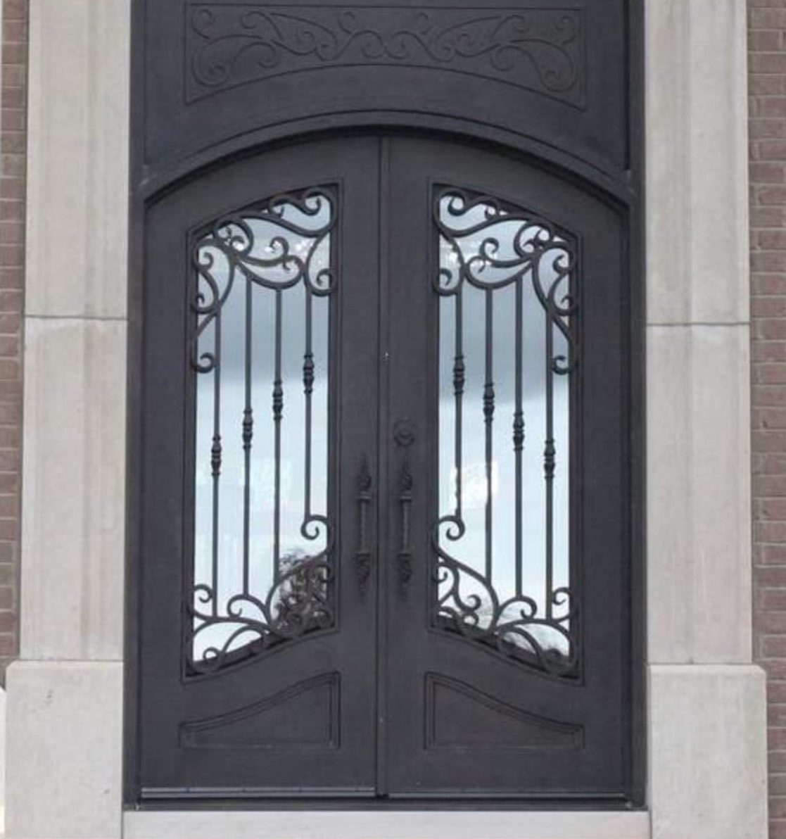 Custom iron door installation in Houston, TX by Tile Zone — combining timeless elegance, modern craftsmanship, and lasting security for your home