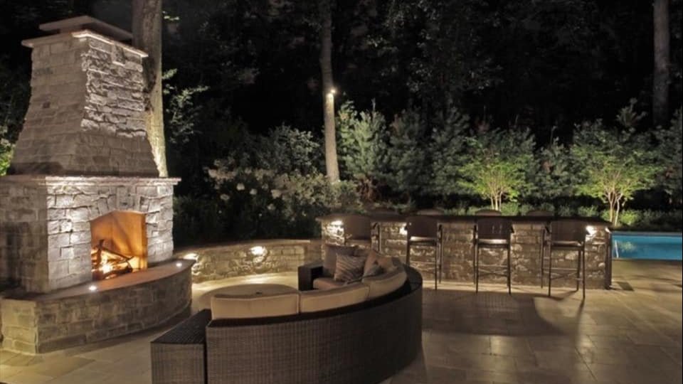 Sugar Land, TX outdoor living space by Tile Zone featuring a custom fireplace and seating area — perfect for gatherings and year-round comfort Sugar Land, TX outdoor living space by Tile Zone featuring a custom fireplace and seating area — perfect for gatherings and year-round comfort