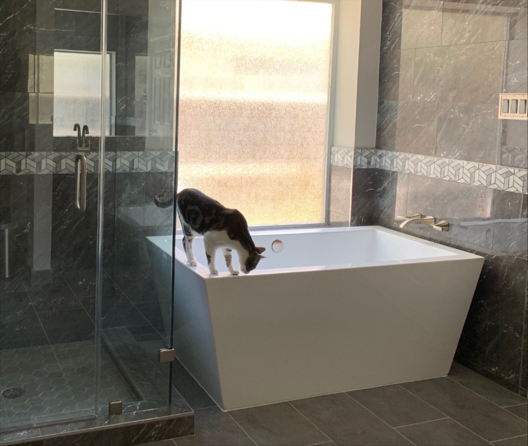 Modern bathroom remodel in Houston, TX by Tile Zone featuring custom tile, glass shower, and contemporary design — built for comfort, style, and lasting quality Modern bathroom remodel in Houston, TX by Tile Zone featuring custom tile, glass shower, and contemporary design — built for comfort, style, and lasting quality