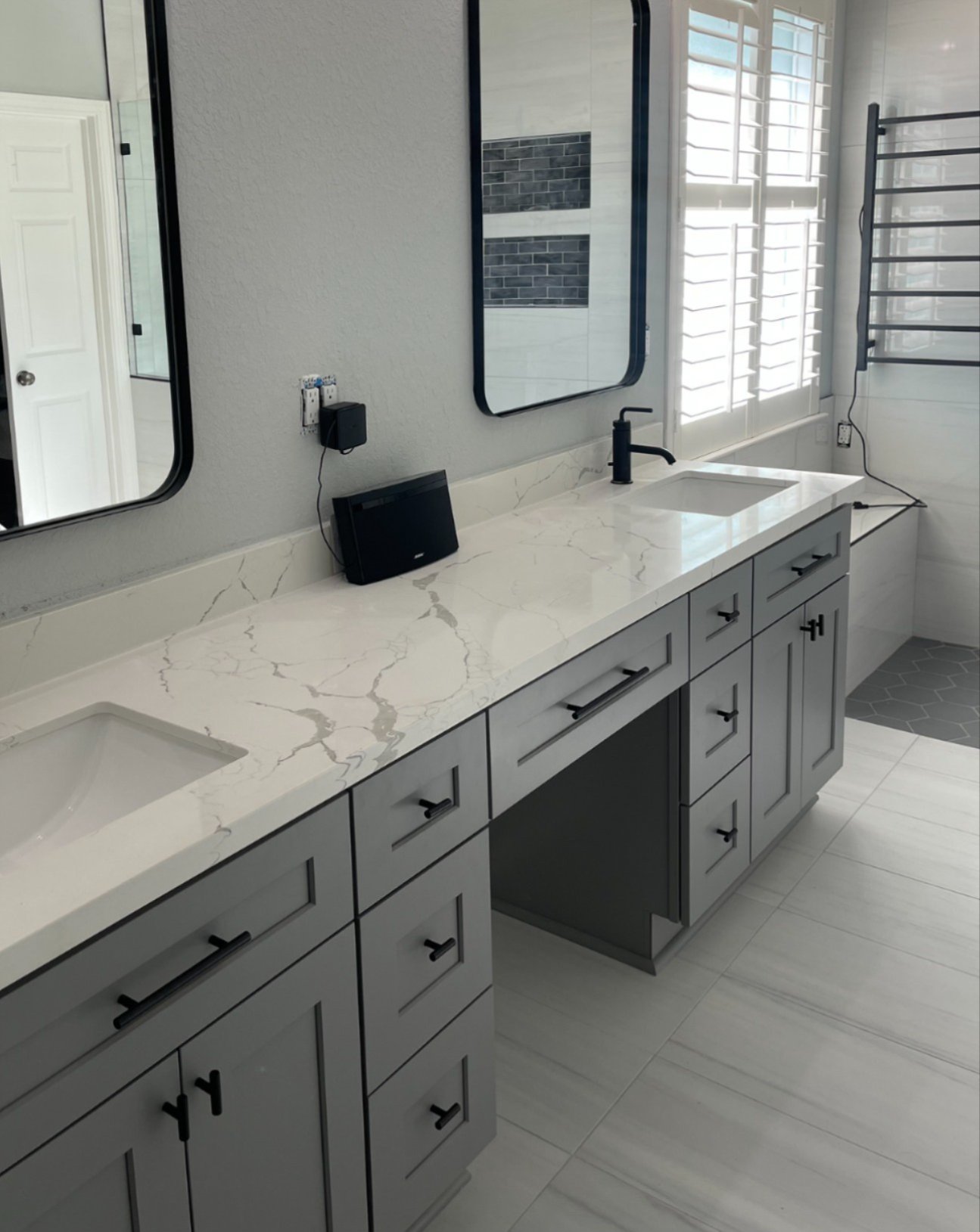 Luxury bathroom remodel in Houston, TX by Tile Zone featuring custom cabinetry, quartz countertops, and premium finishes designed for lasting style Luxury bathroom remodel in Houston, TX by Tile Zone featuring custom cabinetry, quartz countertops, and premium finishes designed for lasting style