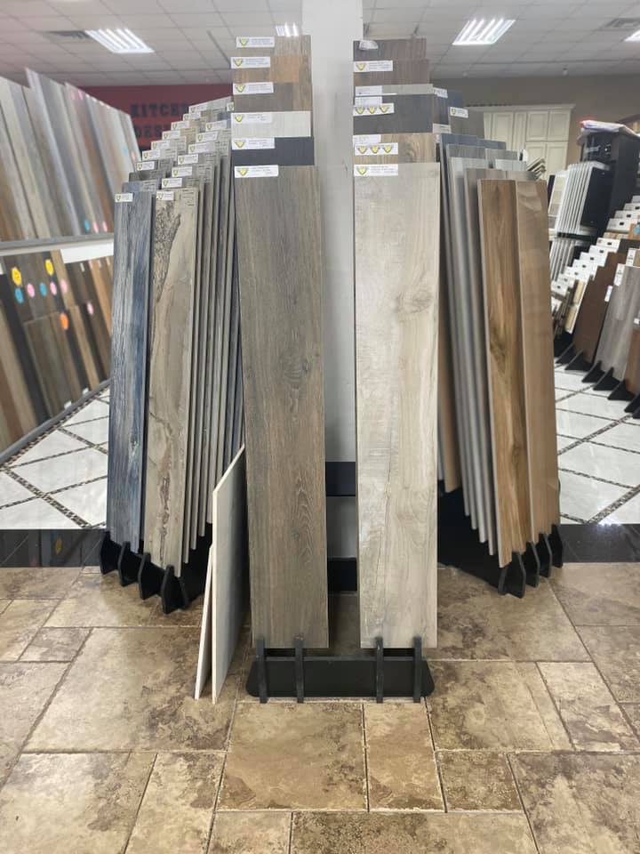 Luxury vinyl and hardwood flooring samples at Tile Zone Houston — explore quality flooring selections with expert remodeling and installation services
