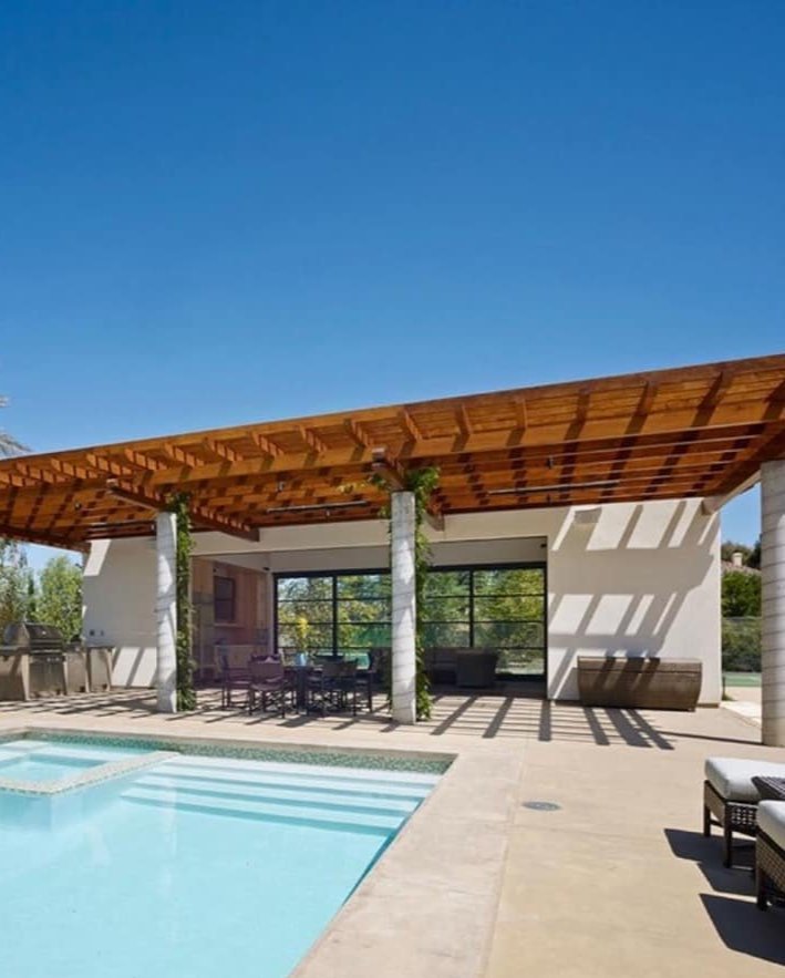 Stylish outdoor living and kitchen space by Tile Zone in Houston, TX — featuring custom design, quality materials, and craftsmanship for entertaining outdoors Stylish outdoor living and kitchen space by Tile Zone in Houston, TX — featuring custom design, quality materials, and craftsmanship for entertaining outdoors