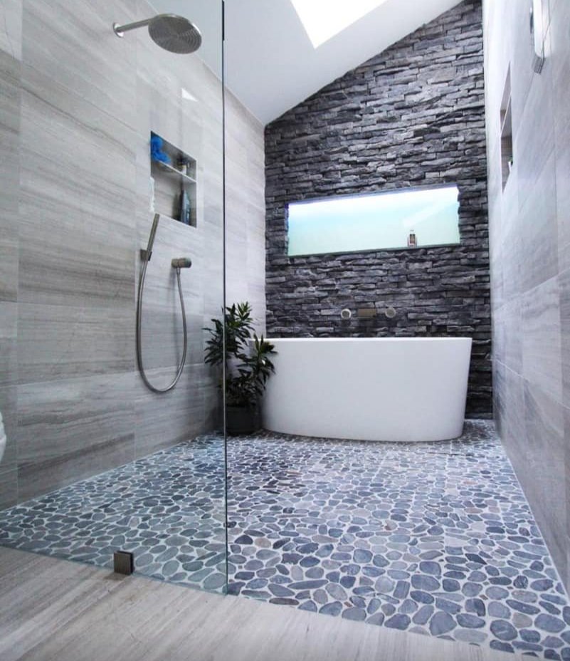 Luxury bathtub remodeling by Tile Zone in Houston, TX — modern bathroom design with premium materials and expert craftsmanship for lasting beauty and comfort Luxury bathtub remodeling by Tile Zone in Houston, TX — modern bathroom design with premium materials and expert craftsmanship for lasting beauty and comfort