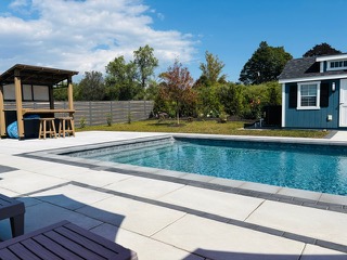 Residential swimming pool prepared for seasonal opening by Poolscape Pools & Spas in Connecticut encouraging early booking to avoid peak pool service season delays Residential swimming pool prepared for seasonal opening by Poolscape Pools & Spas in Connecticut encouraging early booking to avoid peak pool service season delays